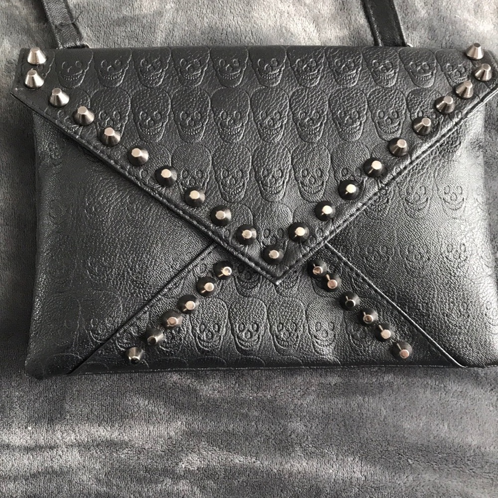 Black studded skull purse.